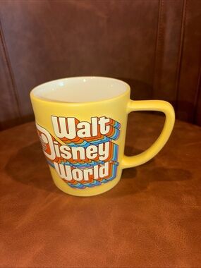 Walt Disney World Retro Yellow Coffee Mug Raised Embossed Rainbow vintage